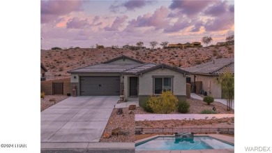 Located in prestigious gated neighborhood of The Canyons At on Laughlin Ranch Golf Club in Arizona - for sale on GolfHomes.com, golf home, golf lot