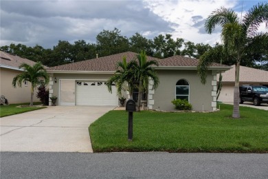 Welcome to this charming 3 bedroom, 3 bath pool home nestled in on Cypresswood Golf and Country Club in Florida - for sale on GolfHomes.com, golf home, golf lot