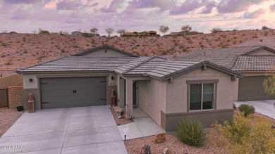 Located in prestigious gated neighborhood of The Canyons At on Laughlin Ranch Golf Club in Arizona - for sale on GolfHomes.com, golf home, golf lot