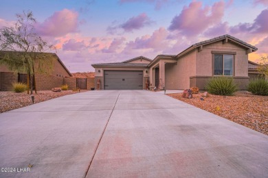 Located in prestigious gated neighborhood of The Canyons At on Laughlin Ranch Golf Club in Arizona - for sale on GolfHomes.com, golf home, golf lot