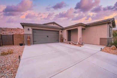 Located in prestigious gated neighborhood of The Canyons At on Laughlin Ranch Golf Club in Arizona - for sale on GolfHomes.com, golf home, golf lot