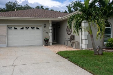 Welcome to this charming 3 bedroom, 3 bath pool home nestled in on Cypresswood Golf and Country Club in Florida - for sale on GolfHomes.com, golf home, golf lot