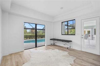 Beautifully updated 4BR/3.5BA CBS home on 1 acre in the gated on Evergreen Club in Florida - for sale on GolfHomes.com, golf home, golf lot