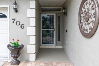 Welcome to this charming 3 bedroom, 3 bath pool home nestled in on Cypresswood Golf and Country Club in Florida - for sale on GolfHomes.com, golf home, golf lot