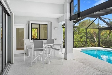 Beautifully updated 4BR/3.5BA CBS home on 1 acre in the gated on Evergreen Club in Florida - for sale on GolfHomes.com, golf home, golf lot