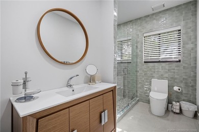 Beautifully updated 4BR/3.5BA CBS home on 1 acre in the gated on Evergreen Club in Florida - for sale on GolfHomes.com, golf home, golf lot