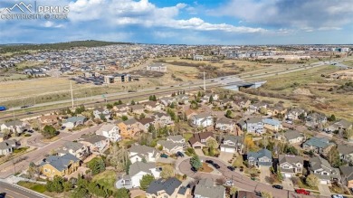 Welcome to this exceptional 5-bedroom, 4-bathroom home that on Pine Creek Golf Club in Colorado - for sale on GolfHomes.com, golf home, golf lot