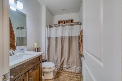 Located in prestigious gated neighborhood of The Canyons At on Laughlin Ranch Golf Club in Arizona - for sale on GolfHomes.com, golf home, golf lot