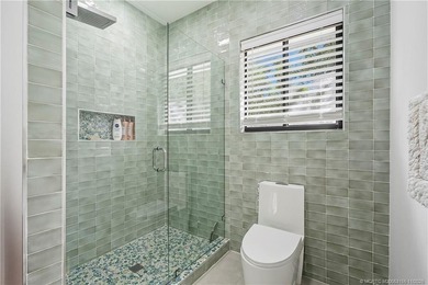 Beautifully updated 4BR/3.5BA CBS home on 1 acre in the gated on Evergreen Club in Florida - for sale on GolfHomes.com, golf home, golf lot