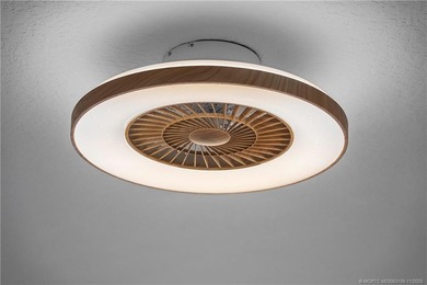 Beautifully updated 4BR/3.5BA CBS home on 1 acre in the gated on Evergreen Club in Florida - for sale on GolfHomes.com, golf home, golf lot