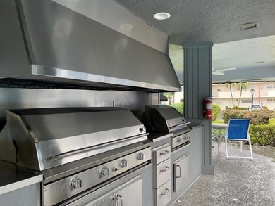 Well maintained updated 2/2 55+ condo, first floor with serene on Hollybrook Golf and Tennis Club  in Florida - for sale on GolfHomes.com, golf home, golf lot