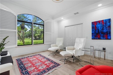 Beautifully updated 4BR/3.5BA CBS home on 1 acre in the gated on Evergreen Club in Florida - for sale on GolfHomes.com, golf home, golf lot