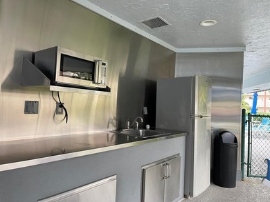 Well maintained updated 2/2 55+ condo, first floor with serene on Hollybrook Golf and Tennis Club  in Florida - for sale on GolfHomes.com, golf home, golf lot