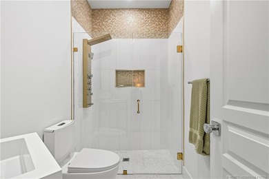 Beautifully updated 4BR/3.5BA CBS home on 1 acre in the gated on Evergreen Club in Florida - for sale on GolfHomes.com, golf home, golf lot