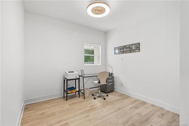 Beautifully updated 4BR/3.5BA CBS home on 1 acre in the gated on Evergreen Club in Florida - for sale on GolfHomes.com, golf home, golf lot