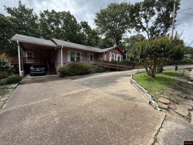 Welcome to this 4 bedroom, 2 bath home offering 1,816 sq ft of on Indian Hills Country Club in Arkansas - for sale on GolfHomes.com, golf home, golf lot