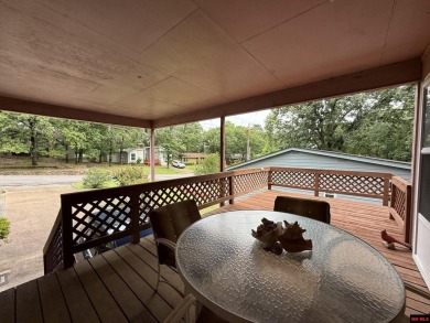Welcome to this 4 bedroom, 2 bath home offering 1,816 sq ft of on Indian Hills Country Club in Arkansas - for sale on GolfHomes.com, golf home, golf lot