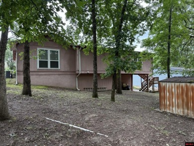 Welcome to this 4 bedroom, 2 bath home offering 1,816 sq ft of on Indian Hills Country Club in Arkansas - for sale on GolfHomes.com, golf home, golf lot