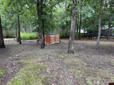 Welcome to this 4 bedroom, 2 bath home offering 1,816 sq ft of on Indian Hills Country Club in Arkansas - for sale on GolfHomes.com, golf home, golf lot