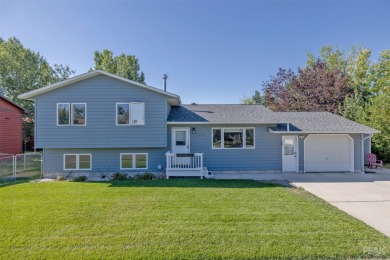 Welcome home to this charming 3 bedroom, 2 bathroom multi-level on Bill Roberts Municipal Golf Course in Montana - for sale on GolfHomes.com, golf home, golf lot