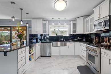 Located in beautiful Indian Bayou, this remodeled 3BR, 2BA on Indian Bayou Golf and Country Club in Florida - for sale on GolfHomes.com, golf home, golf lot