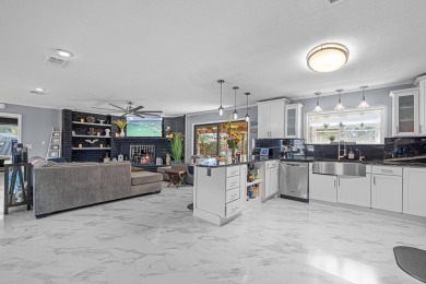 Located in beautiful Indian Bayou, this remodeled 3BR, 2BA on Indian Bayou Golf and Country Club in Florida - for sale on GolfHomes.com, golf home, golf lot
