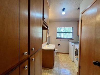 Discover the perfect blend of privacy and community in this on Rayburn Country Club in Texas - for sale on GolfHomes.com, golf home, golf lot
