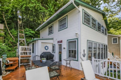 Klinger Lake Cottage-Enjoy beautiful sunsets and 50 feet of on Klinger Lake Country Club in Michigan - for sale on GolfHomes.com, golf home, golf lot