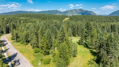 Perfect setting overlooking the elevated 4th green of Meadow on Meadow Lake Golf Resort in Montana - for sale on GolfHomes.com, golf home, golf lot