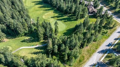 Perfect setting overlooking the elevated 4th green of Meadow on Meadow Lake Golf Resort in Montana - for sale on GolfHomes.com, golf home, golf lot