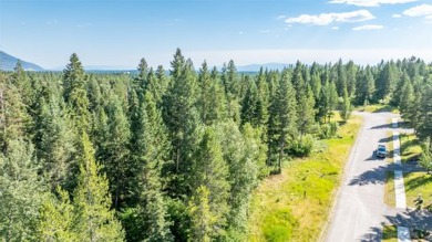 Perfect setting overlooking the elevated 4th green of Meadow on Meadow Lake Golf Resort in Montana - for sale on GolfHomes.com, golf home, golf lot