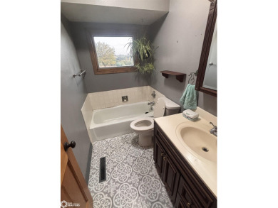 Location, location, location. Close to town, with some land 8 on Edmundson Golf Course in Iowa - for sale on GolfHomes.com, golf home, golf lot