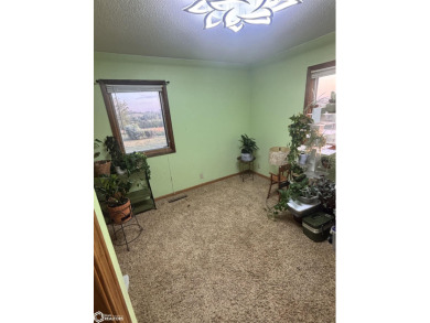 Location, location, location. Close to town, with some land 8 on Edmundson Golf Course in Iowa - for sale on GolfHomes.com, golf home, golf lot