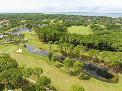 Located in beautiful Indian Bayou, this remodeled 3BR, 2BA on Indian Bayou Golf and Country Club in Florida - for sale on GolfHomes.com, golf home, golf lot