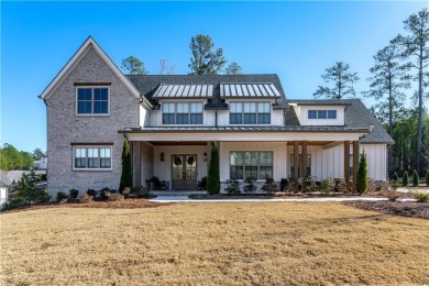 Welcome to this wonderfully modern farmhouse in the stunning on The Governors Towne Club in Georgia - for sale on GolfHomes.com, golf home, golf lot