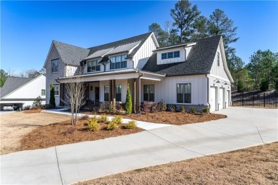 Welcome to this wonderfully modern farmhouse in the stunning on The Governors Towne Club in Georgia - for sale on GolfHomes.com, golf home, golf lot