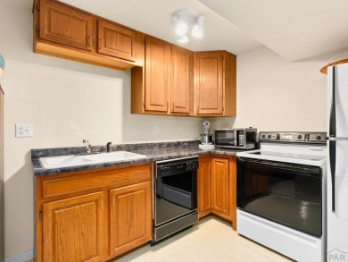 This one owner home is priced to sell quickly. Large lot almost on Desert Hawk At Pueblo West in Colorado - for sale on GolfHomes.com, golf home, golf lot