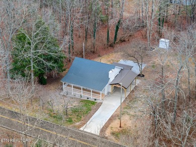 Your Tennessee Dream Cabin Awaits. Turn Key Charming 1,560 Sq Ft on Lake Tansi Village Country Club in Tennessee - for sale on GolfHomes.com, golf home, golf lot