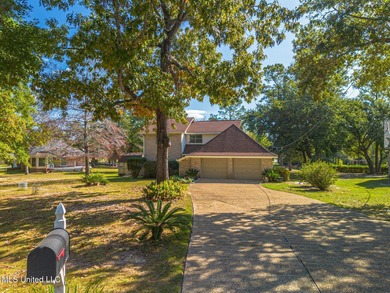 Welsome to this immaculate home in Diamondhead, perfectly on Diamondhead Country Club in Mississippi - for sale on GolfHomes.com, golf home, golf lot