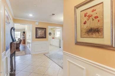 Welsome to this immaculate home in Diamondhead, perfectly on Diamondhead Country Club in Mississippi - for sale on GolfHomes.com, golf home, golf lot