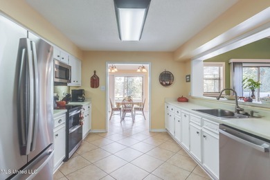 Welsome to this immaculate home in Diamondhead, perfectly on Diamondhead Country Club in Mississippi - for sale on GolfHomes.com, golf home, golf lot