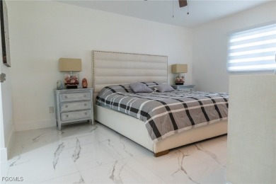 Spacious 4BR/2BA Cape Coral home with a private mother-in-law on Burnt Store Golf Club in Florida - for sale on GolfHomes.com, golf home, golf lot