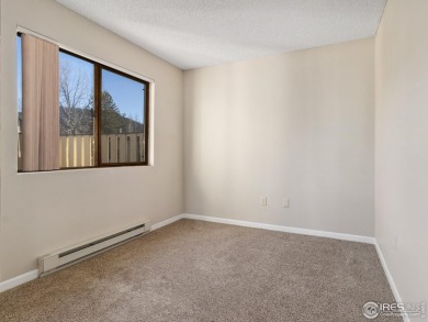 Looking for an immaculately maintained, main-level condo? Look on Estes Park Golf Course in Colorado - for sale on GolfHomes.com, golf home, golf lot