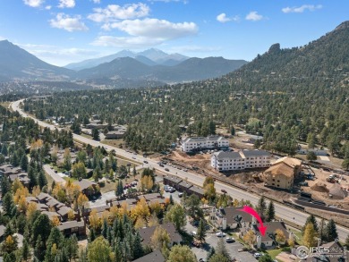 Looking for an immaculately maintained, main-level condo? Look on Estes Park Golf Course in Colorado - for sale on GolfHomes.com, golf home, golf lot