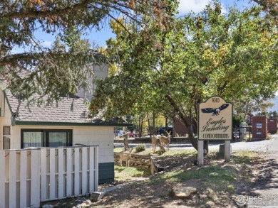 Looking for an immaculately maintained, main-level condo? Look on Estes Park Golf Course in Colorado - for sale on GolfHomes.com, golf home, golf lot