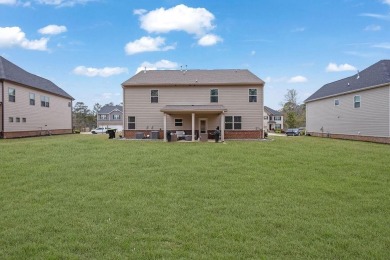 Welcome home to 8033 Louis Drive! A meticulously cared for on Canongate At Heron Bay in Georgia - for sale on GolfHomes.com, golf home, golf lot