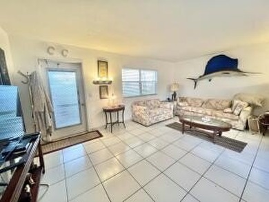 Live the Florida lifestyle in this 1st floor remodeled apartment on Addison Reserve in Florida - for sale on GolfHomes.com, golf home, golf lot