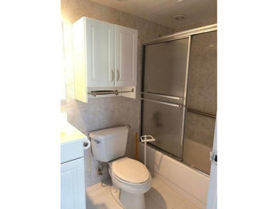 Live the Florida lifestyle in this 1st floor remodeled apartment on Addison Reserve in Florida - for sale on GolfHomes.com, golf home, golf lot