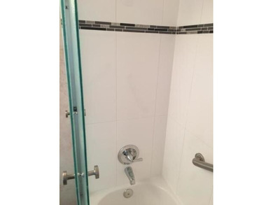 Live the Florida lifestyle in this 1st floor remodeled apartment on Addison Reserve in Florida - for sale on GolfHomes.com, golf home, golf lot