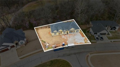 Welcome to this exquisite 3,343 sqft home, offering 5 spacious on Big Sugar Golf Club in Arkansas - for sale on GolfHomes.com, golf home, golf lot